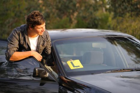 Can I be fined for driving with L or P plates if I hold a full licence?