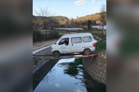 Would you drive your van over a river using a monkey bridge?